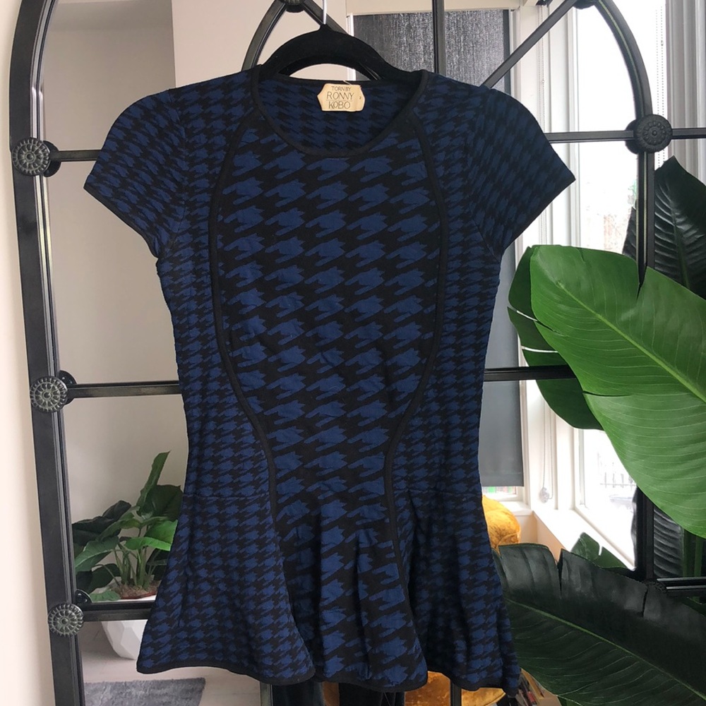 Blue and black knit peplum top